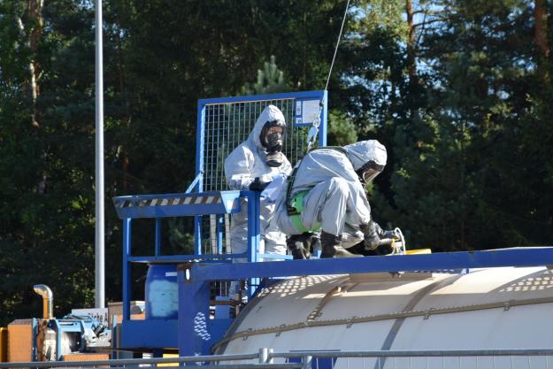 Samples are collected from a container with Libyan precursor chemicals at a specialised destruction facility operated by GEKA in Munster, Germany. Photo: GEKATanks containing Libyan chemicals are unloaded at the port of Bremen, Germany. Photo: Defence Command Denmark