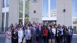 OPCW Director-General Ahmet Üzümcü and Deputy Director-General Hamid Ali Rao (both center) with participants at the Symposium on Women in Chemistry.