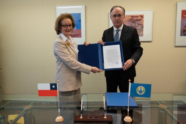 OPCW Director-General, H.E. Mr Fernando Arias, and the Permanent Representative of Chile to the OPCW, H.E. Ambassador Maria Teresa Infante