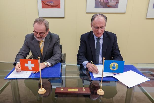 OPCW Director-General, H.E. Mr Fernando Arias, and the Permanent Representative of Switzerland to the OPCW, H.E. Ambassador Heinz Walker-Nederkoorn