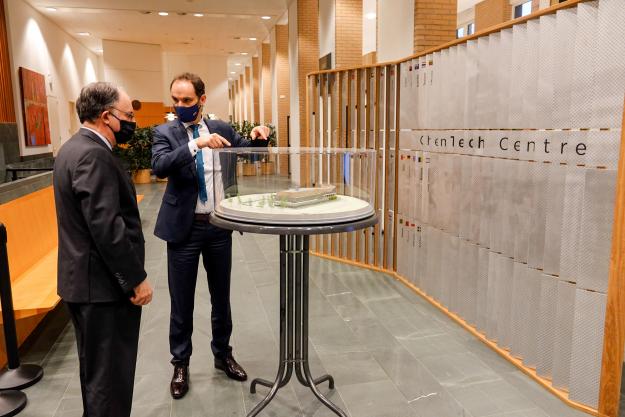H.E. Dr Anže Logar, Minister of Foreign Affairs of the Republic of Slovenia and H.E. Mr Fernando Arias, Director-General of the OPCW look at the proposed design of the new OPCW ChemTech Centre