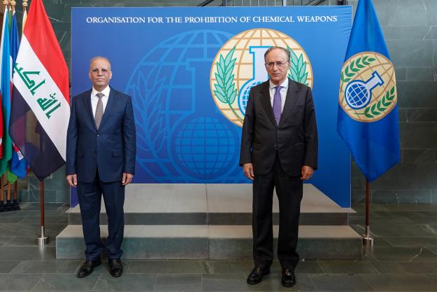 Deputy Minister for Legal and Multilateral Affairs of the Republic of Iraq, H.E. Dr Kahtan Al-Janabi (left), and Director-General of the Organisation for the Prohibition of Chemical Weapons (OPCW), H.E. Mr Fernando Arias (right)