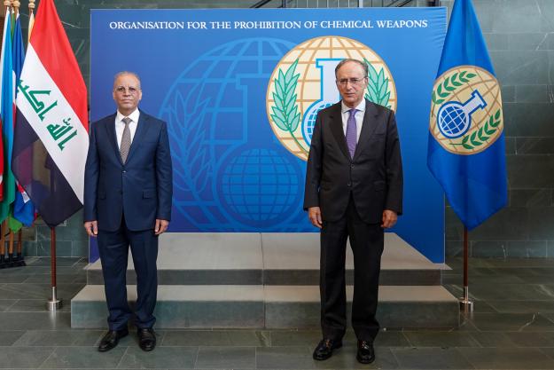 Deputy Minister for Legal and Multilateral Affairs of the Republic of Iraq, H.E. Dr Kahtan Al-Janabi (left), and Director-General of the Organisation for the Prohibition of Chemical Weapons (OPCW), H.E. Mr Fernando Arias (right)