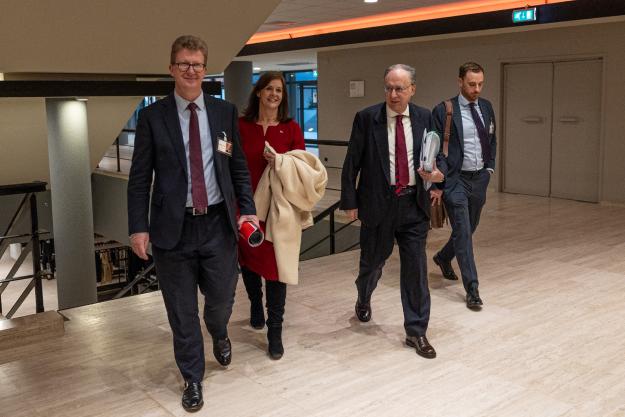 Ambassador Fernando Arias, Director-General of the OPCW, walks to meeting with Mr Stephen Lillie, UK Director for Defence and International Security, and their respective delegations.