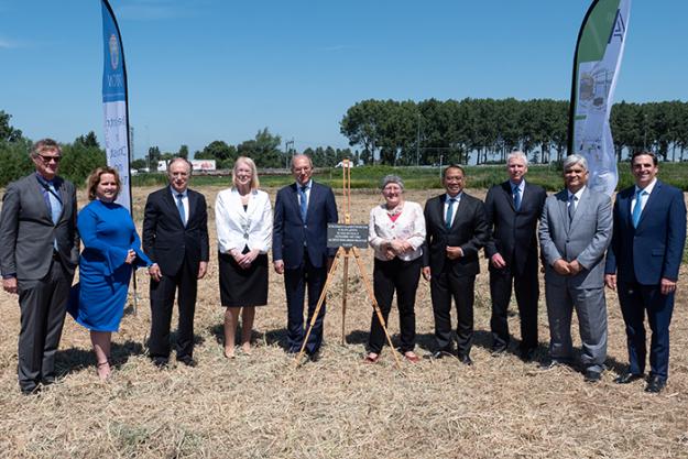 OPCW Director-General, Director-General Designate, Deputy Director-General, and dignitaries at the potential site for the OPCW’s Centre for Chemistry and Technology.
