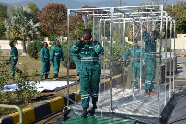 Participants conduct decontamination procedures during the International Integrated Advanced Course and Exercise on Assistance and Protection, held from 4 to 11 November 2025 in Islamabad, Pakistan.