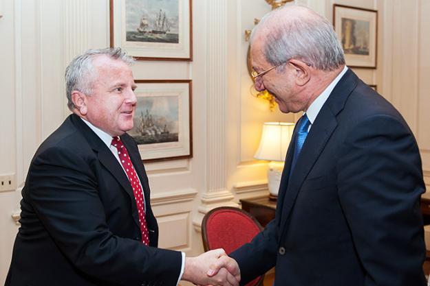 Deputy Secretary of State for the U.S. Department of State, Mr John J. Sullivan, and OPCW Director-General, Ambassador Ahmet Üzümcü, shake hands.