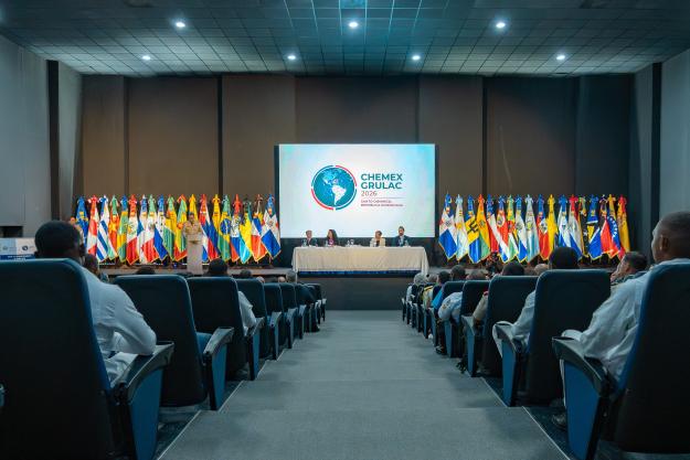 Mayor Gral. doctor Francisco A. Ovalle Pichardo, ERD, Coordinator Gral. de los Ejercicios para la R.D. delivers remarks at the opening session of CHEMEX GRULAC 2026 on 27 April. (L-R): H.E. Mr Raul Fuentes Milani, Ambassador of the EU to the Dominican Republic; Ms Rebecca Eapen, Head of OPCW Assistance and Protection Branch; H.E. Jacqueline Delima Baril, Ambassador of Canada to the Dominican Republic; H.E. Mr Carlos de la Mota Jiménez, Permanent Representative of the Dominican Republic to the OPCW