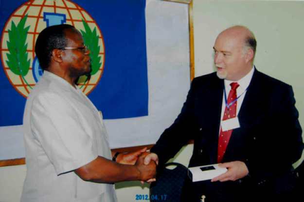 Mr. Mark Bor, Kenya's Permanent Secretary at the Ministry of Public Health and Sanitation, welcomes Mark Albon, OPCW's Head of Implementation Support.