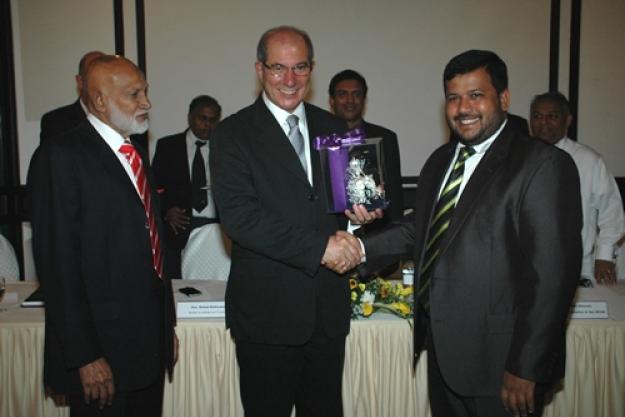 OPCW Director-General Ahmet Üzümcü (centre), Minister of Industry and Commerce, Rishad Bathiudeen (right) and A.H.M. Fowzie, Minister of Economic Development, both of Sri Lanka, at the opening of the Regional Meeting of CWC States Parties in Asia.