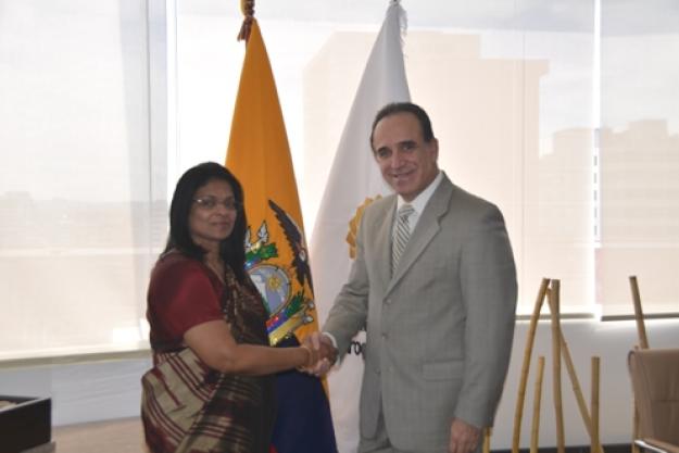 The OPCW Deputy Director-General, Mrs. Grace Asirwatham, with Ecuador's Minister of Industry and Productivity, Dr. Ramiro Gonzalez.