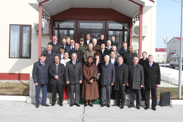 Acting Executive Council Chairperson H.E Mrs. Odette Melono (front row, center) Director-General Ahmet Uzumcu (third from left) and members of the OPCW delegation at the Chemical Weapon Destruction Facility at Kizner, Udmurt Republic in April 2014.