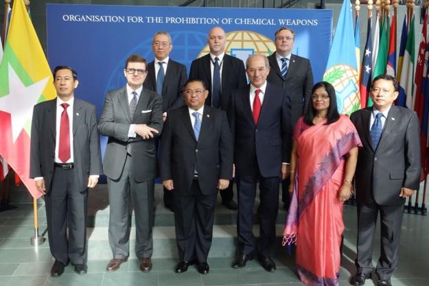 Myanmar’s Foreign Minister, Mr Wunna Maung Lwin (center) and members from the delegation of Myanmar with OPCW Executive Council Chairperson Francesco Azzarello of Italy (second from left), Director-General Ahmet Üzümcü (third from right), Deputy Director-General Mrs Grace Asirwatham (second from right) and members of OPCW senior management.