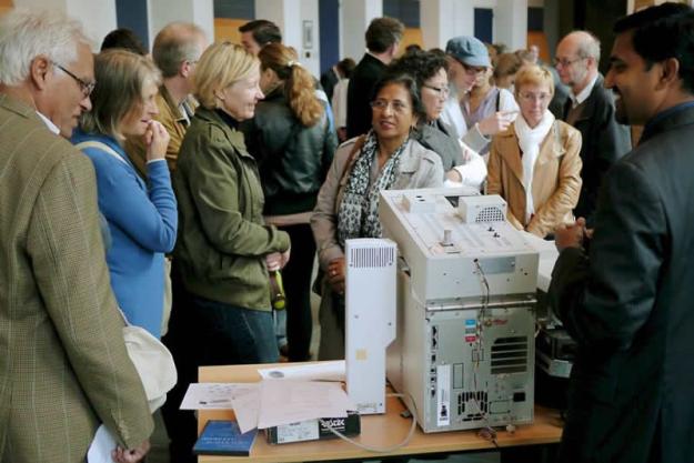 Participants at Open Day learning about inspection equipment