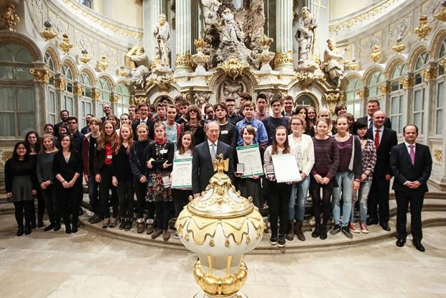 OPCW Director-General Ahmet Üzümcü (center) and the winners of a student competition on the theme of achieving a world free of chemical weapons. Photo Credit: Steffen Füssel