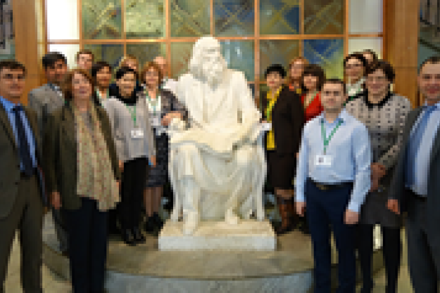 Participants taking part in the strategic planning and decision making exercise “Pyramid”Group photo of the workshop participants at the statue of D.I. Mendeleev at MUCTR