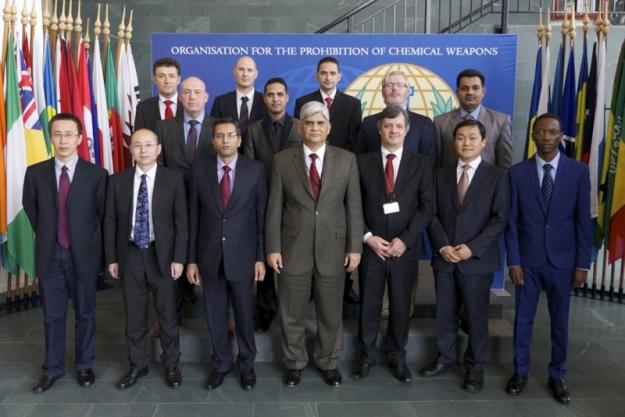 OPCW Deputy Director-General (center), OPCW Director of Inspectorate Division (center right) and the new group of chemical weapons inspectors.