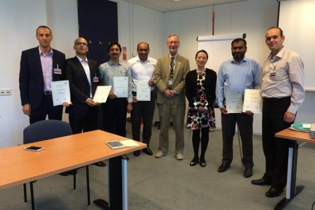 Six analytical chemists from laboratories in Pakistan and Algeria with OPCW staff at the Proficiency Test Course in Rijswijk, The Netherlands.Analytical chemists at the Proficiency Test Course.