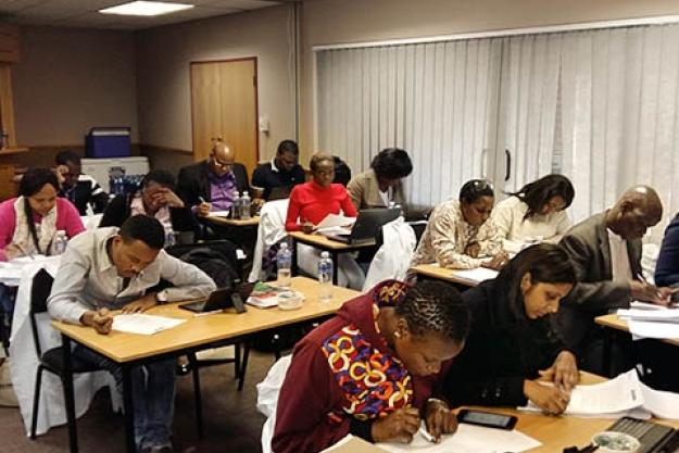 Participants at an OPCW training on analysing chemicals related to the Chemical Weapons Convention in Pretoria, South Africa