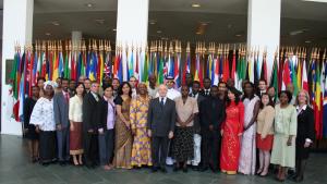 The participants of the Associate Programme 2009 pose with OPCW Director-General on the day of the closing ceremony of this year's programme. 