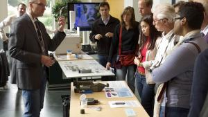 Attendees at the 2015 edition of The Hague International Day learn how inspection equipment works.