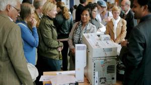 Participants at Open Day learning about inspection equipment