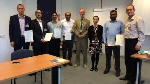 Six analytical chemists from laboratories in Pakistan and Algeria with OPCW staff at the Proficiency Test Course in Rijswijk, The Netherlands.Analytical chemists at the Proficiency Test Course.