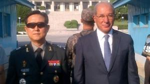 OPCW Director-General at the Joint Security Area.North Korean soldiers taking a photograph of the Director-General's visit.