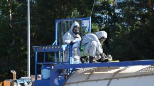 Samples are collected from a container with Libyan precursor chemicals at a specialised destruction facility operated by GEKA in Munster, Germany. Photo: GEKATanks containing Libyan chemicals are unloaded at the port of Bremen, Germany. Photo: Defence Command Denmark